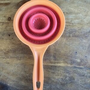 Dexas POP N Store Collapsible Silicone Hand Held Colander Strainer Red / Orange